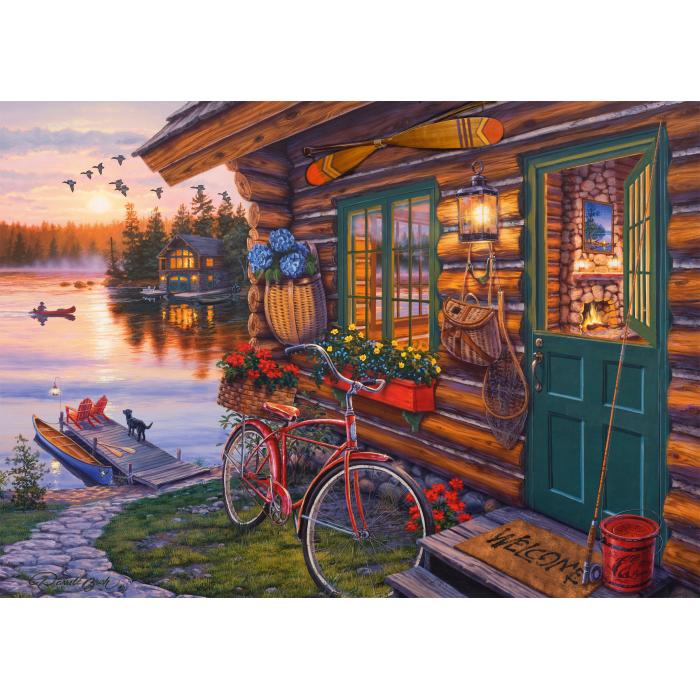 Puzzle Kućica na jezeru s biciklom